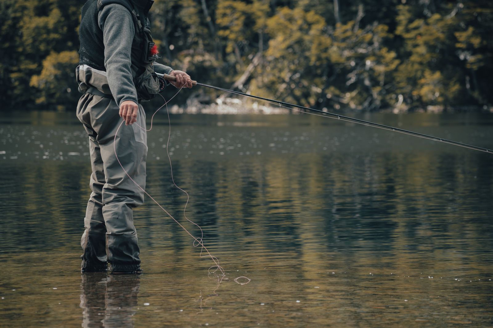 Angler wading in a river